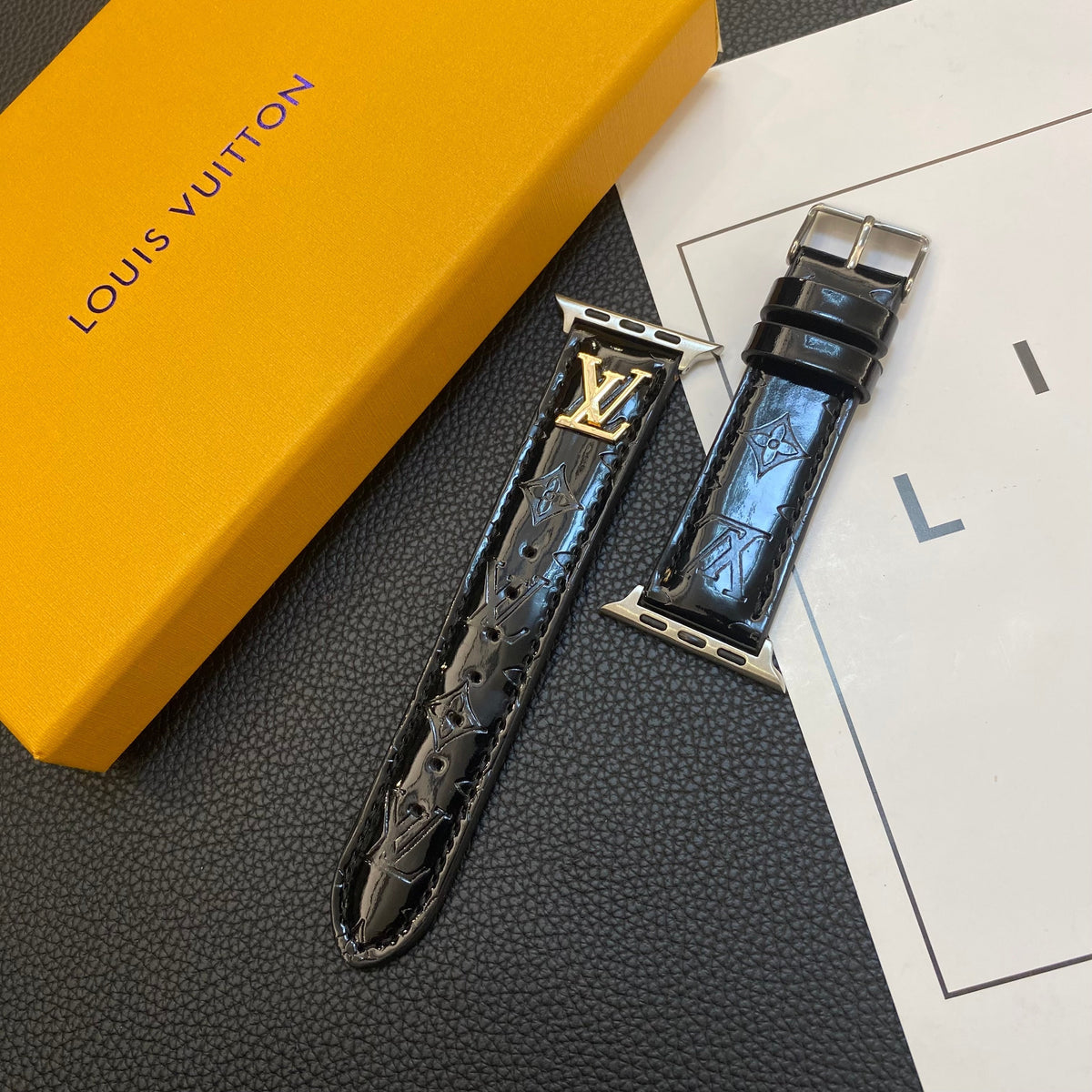 GLOSSY LEATHER APPLE WATCH STRAP LUXURY METAL LOGO