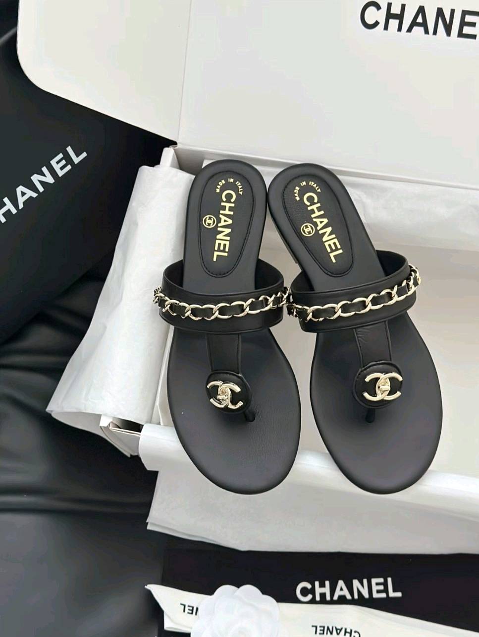 Luxury diamond-quilted flat slides with metal embellishments